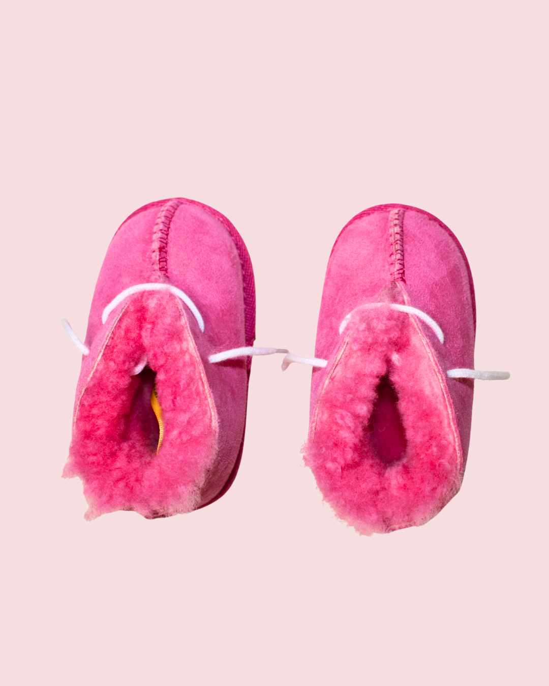 Chaussons roses en mouton taille 18