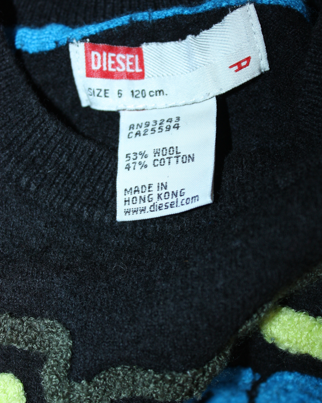 Pull en laine noir à broderies 6 ans