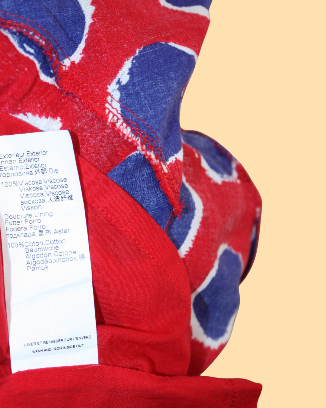 Robe rouge à pois bleus 2 ans