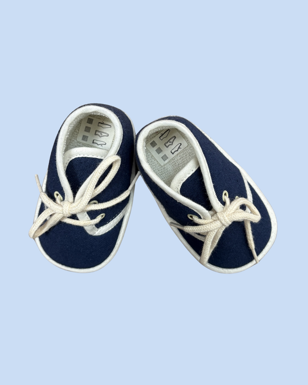 Petits chaussons vintage en toile bleue à lacets taille 18