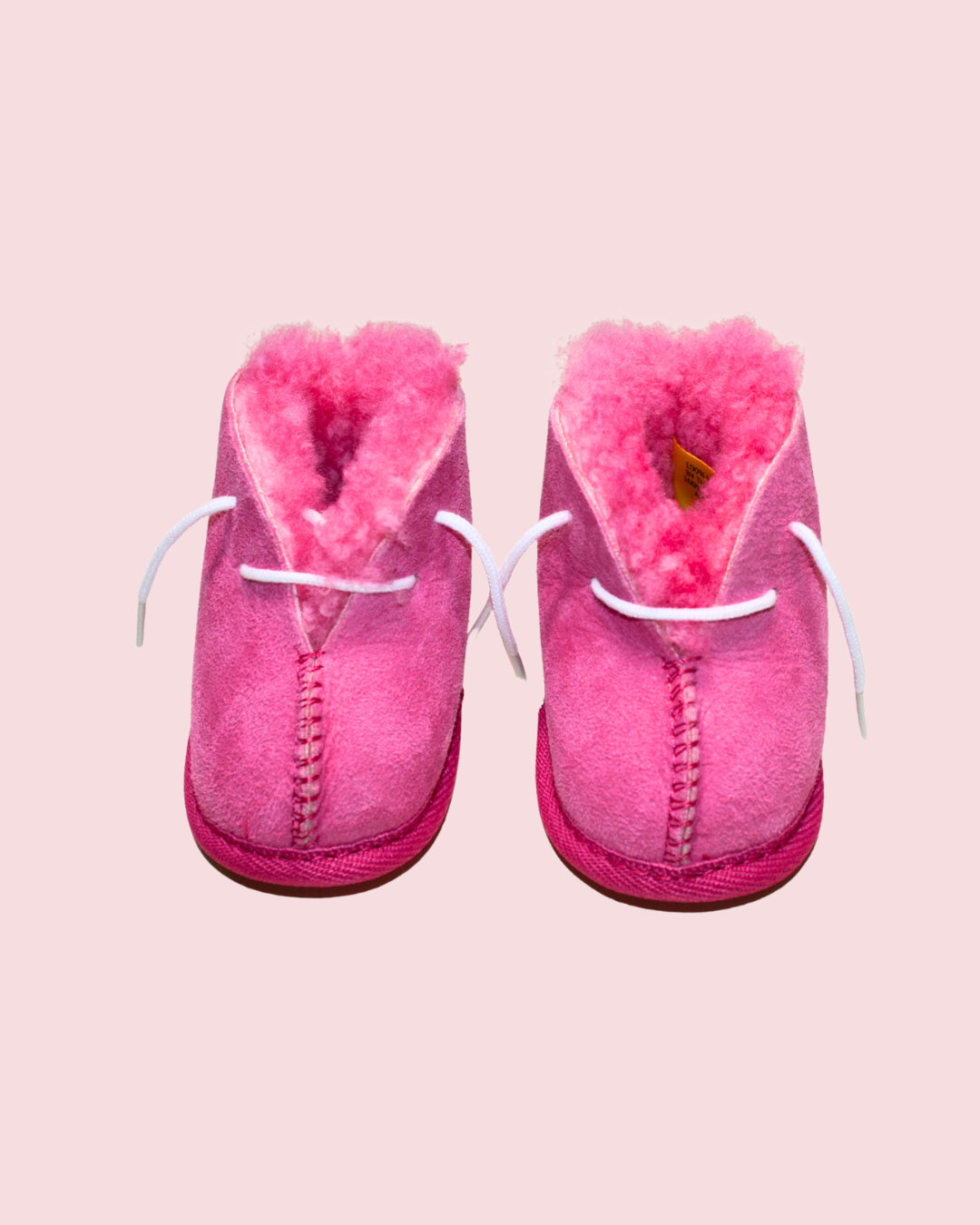 Chaussons roses en mouton taille 18