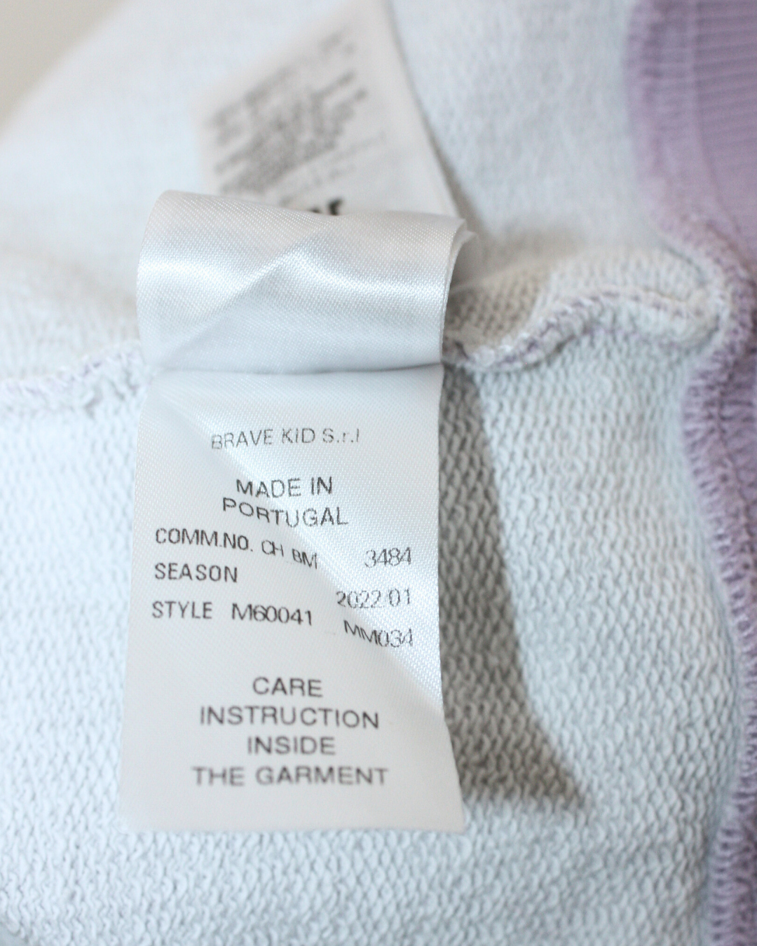 Sweat mauve avec inscription 8 ans