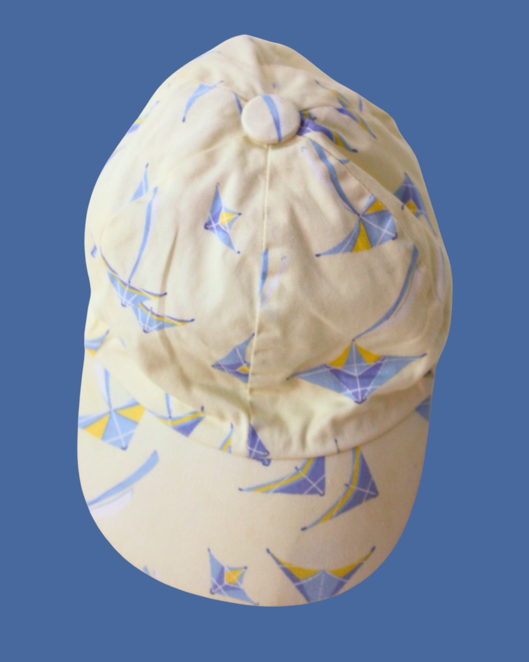 Casquette jaune et bleue - 12 mois