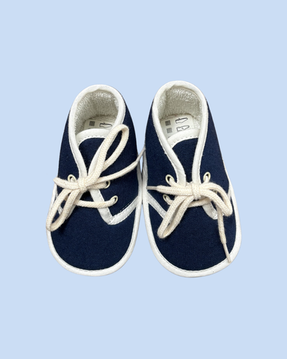Petits chaussons vintage en toile bleue à lacets taille 18