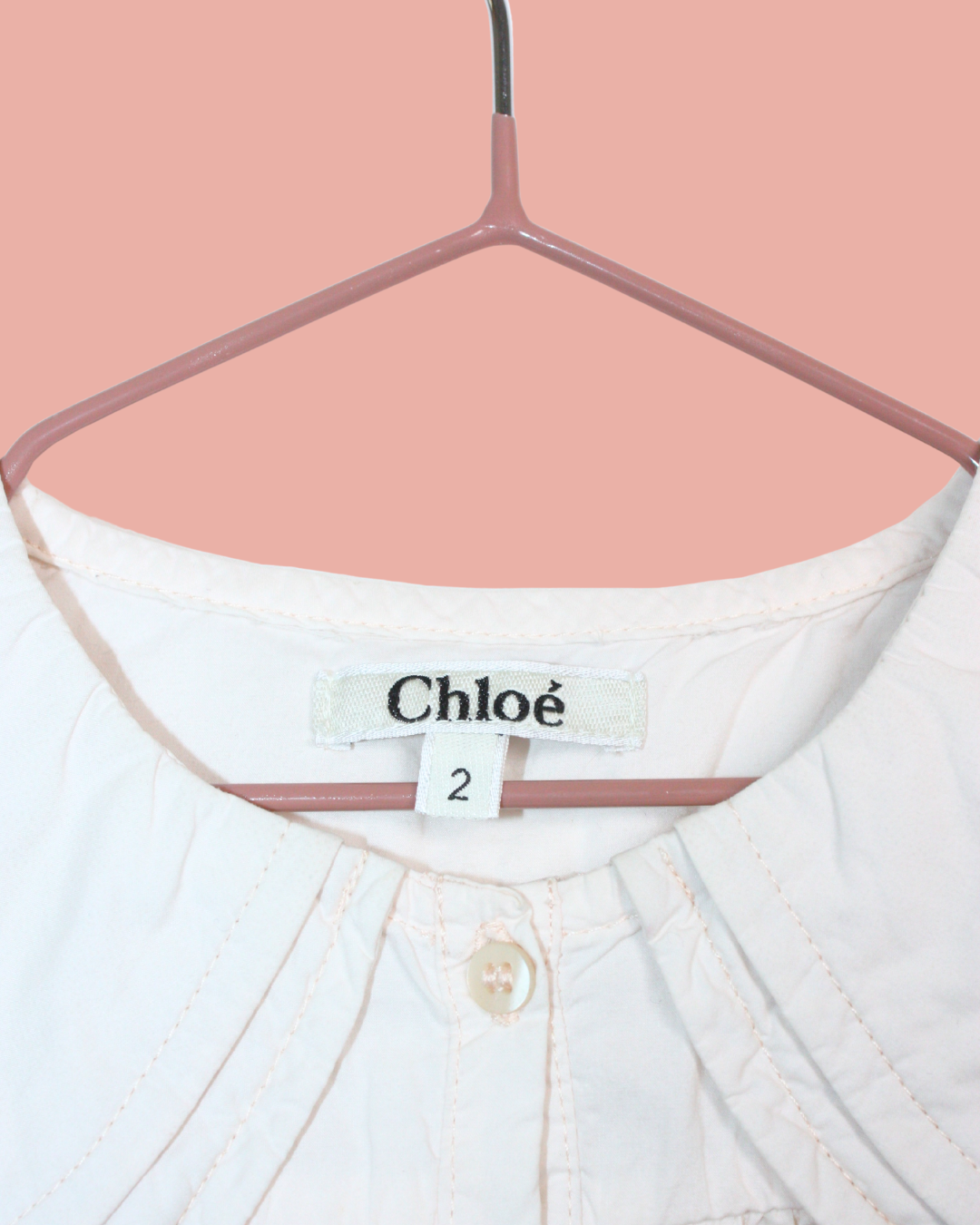 Robe rose pâle à faux col 2 ans