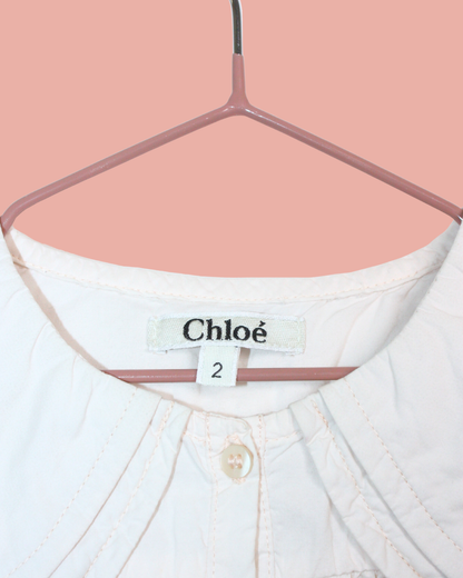 Robe rose pâle à faux col 2 ans