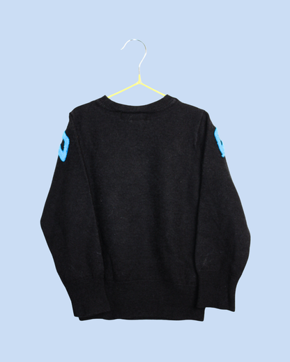 Pull en laine noir à broderies 6 ans