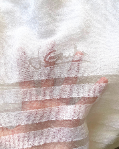 Gilet en maille blanche 2 ans