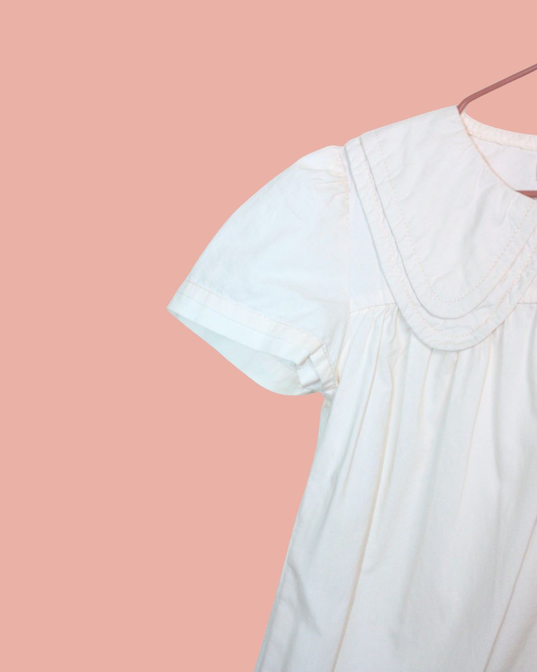 Robe rose pâle à faux col 2 ans