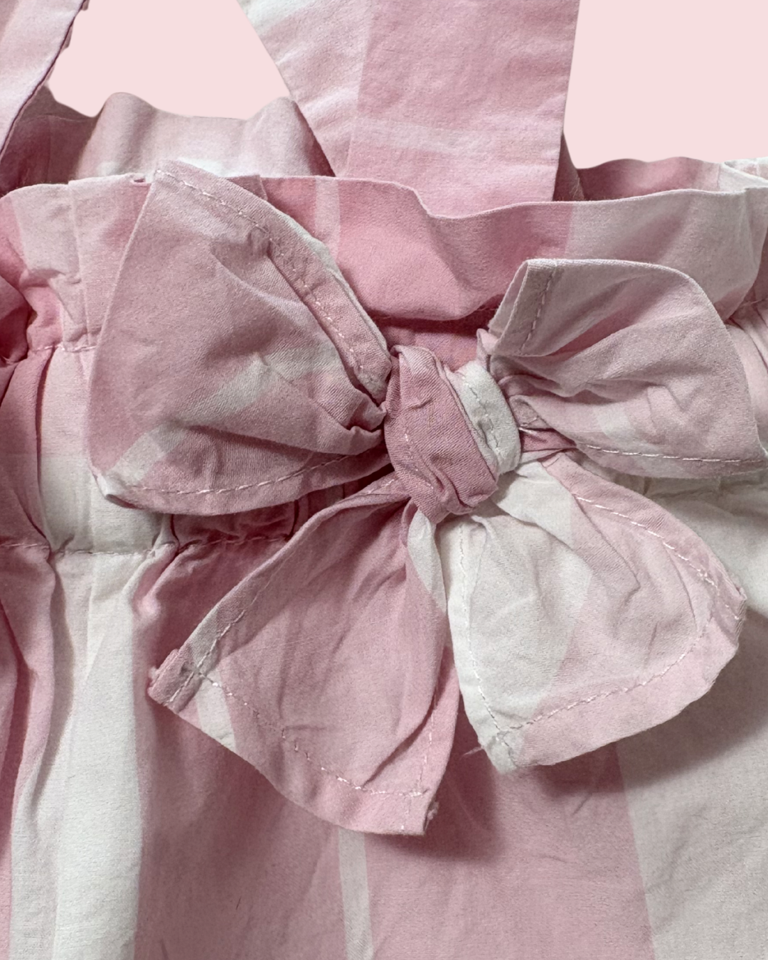 Salopette rose à carreaux 9 mois