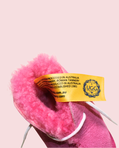 Chaussons roses en mouton taille 18