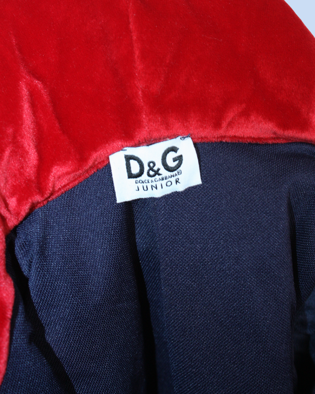 Veste en velours rouge et bleu 2 ans