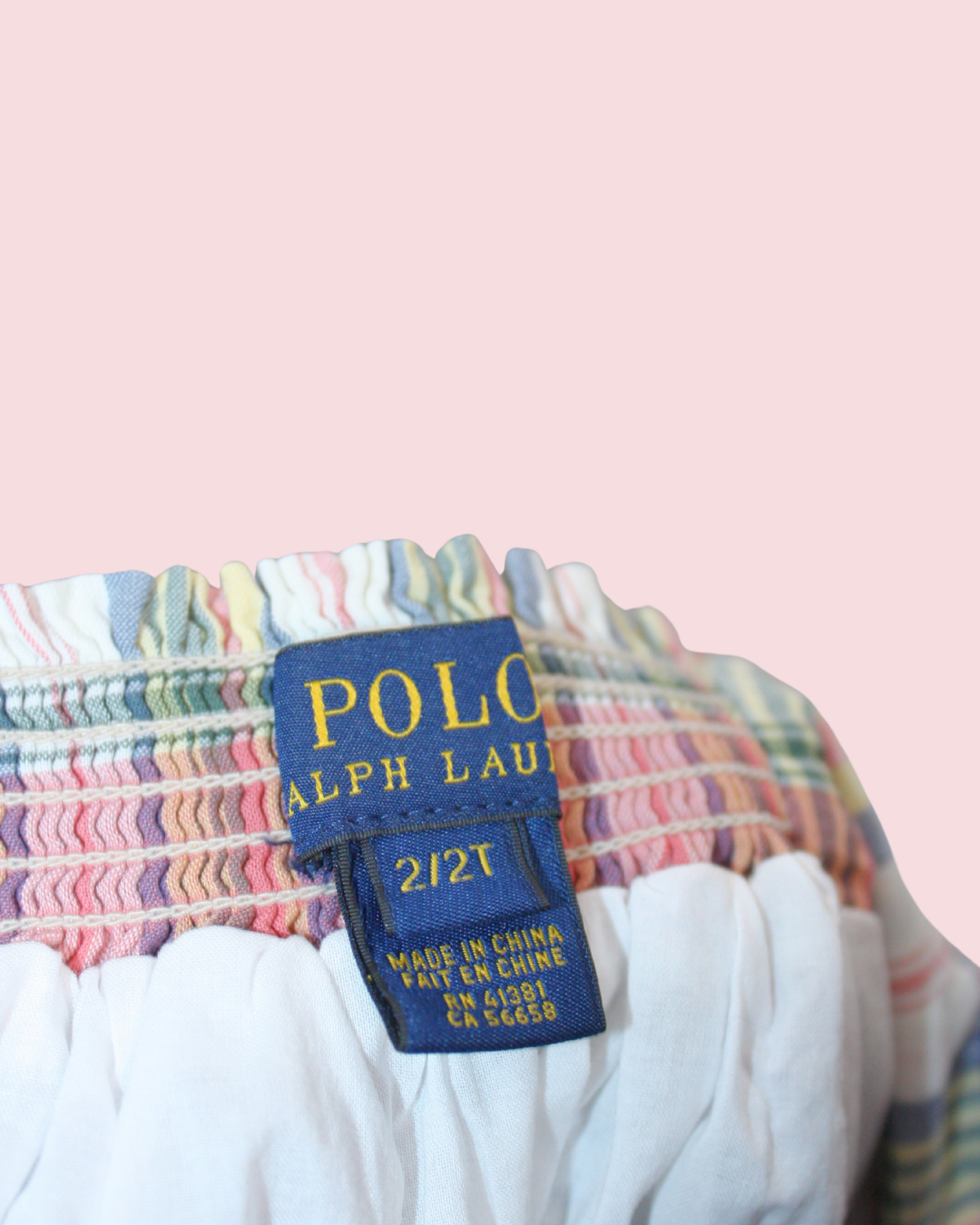 Robe rose à carreaux 2 ans