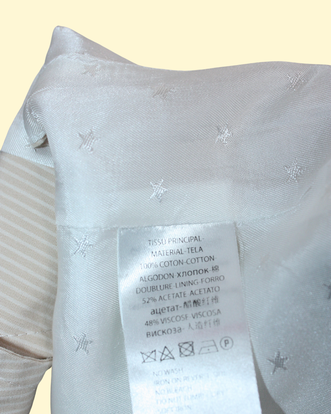 Veston beige et blanc à rayures et étoiles 4 ans