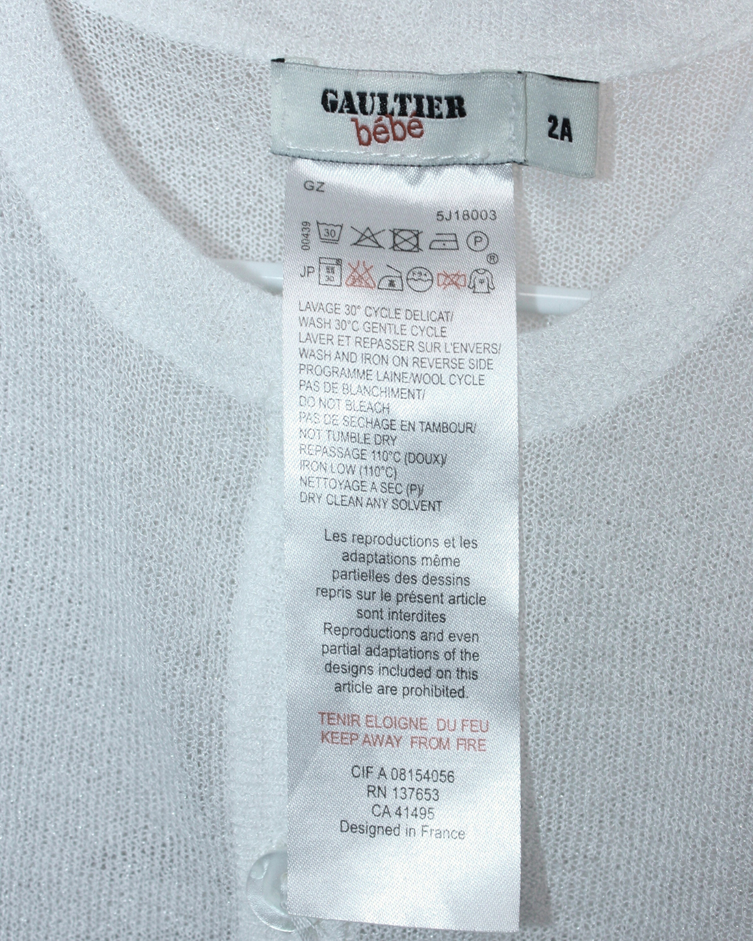 Gilet en maille blanche 2 ans