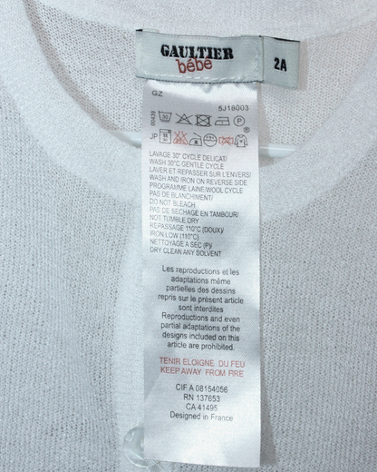 Gilet en maille blanche 2 ans