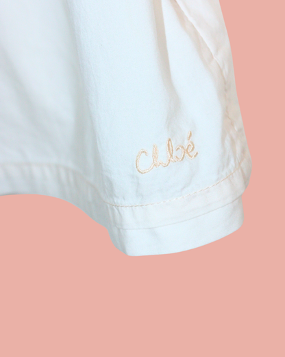 Robe rose pâle à faux col 2 ans