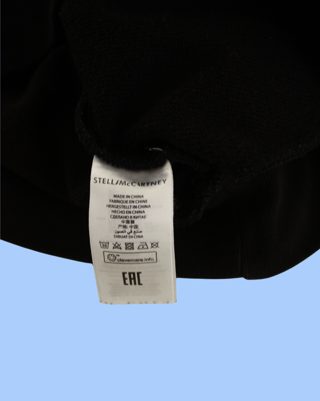 Hoodie noir motif surf et skate 4 ans