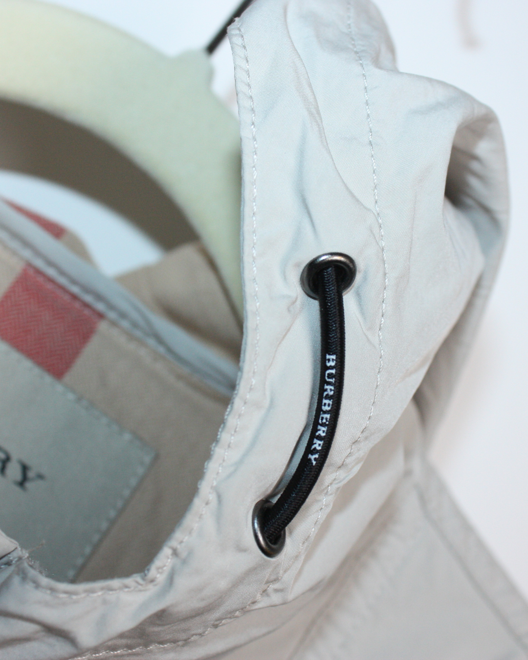 Blouson coupe-vent à capuche beige 8 ans