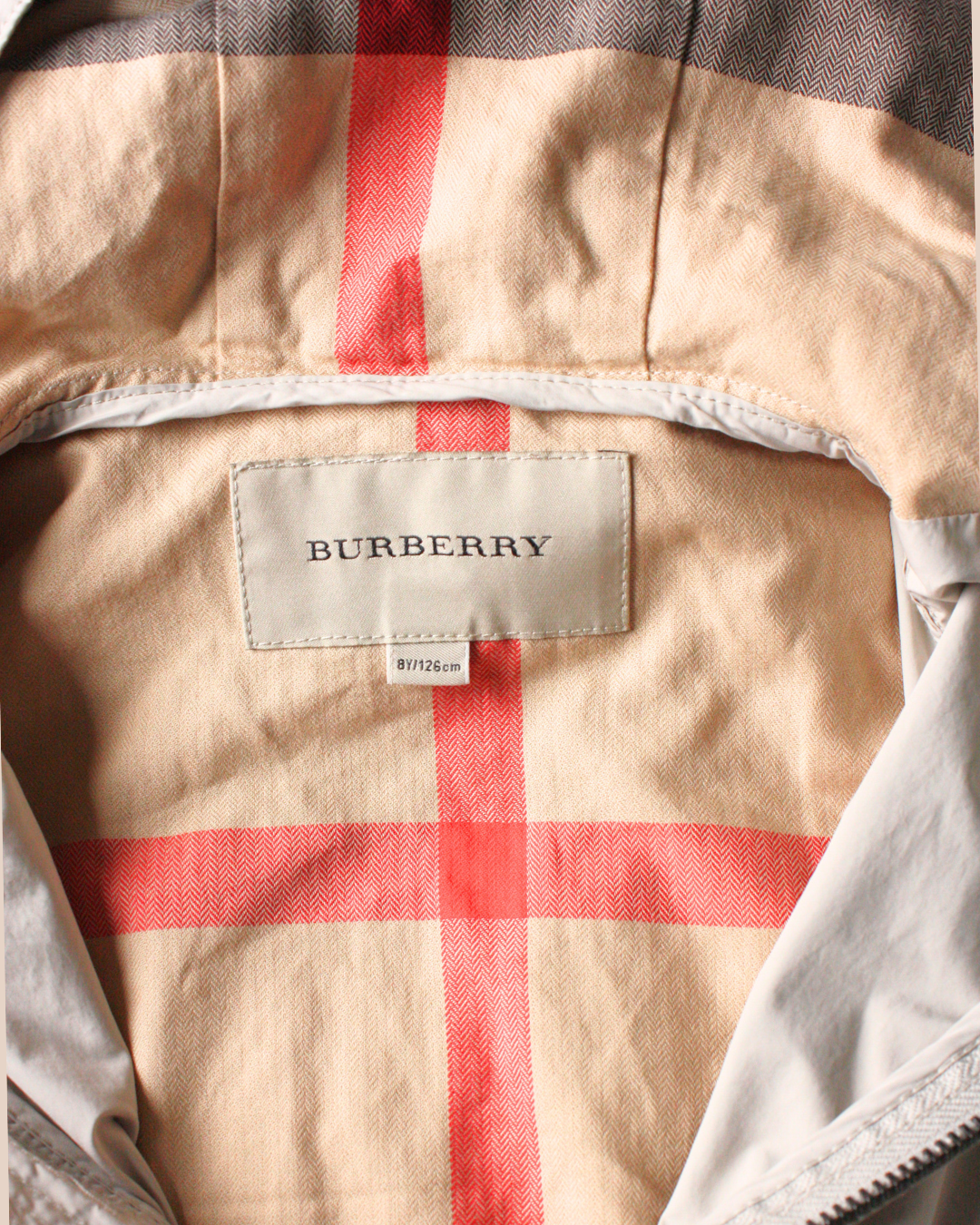 Blouson coupe-vent à capuche beige 8 ans