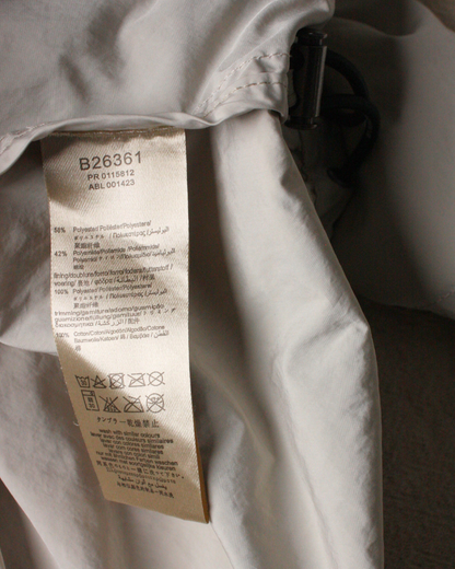 Blouson coupe-vent à capuche beige 8 ans