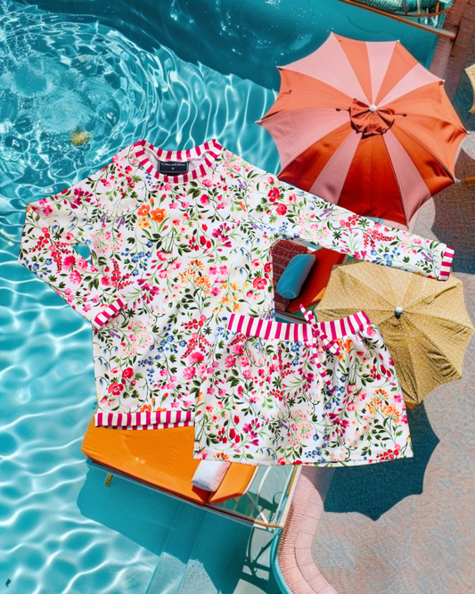 Maillot de bain fleuri  et rayé rose et blanc taille 3 ans