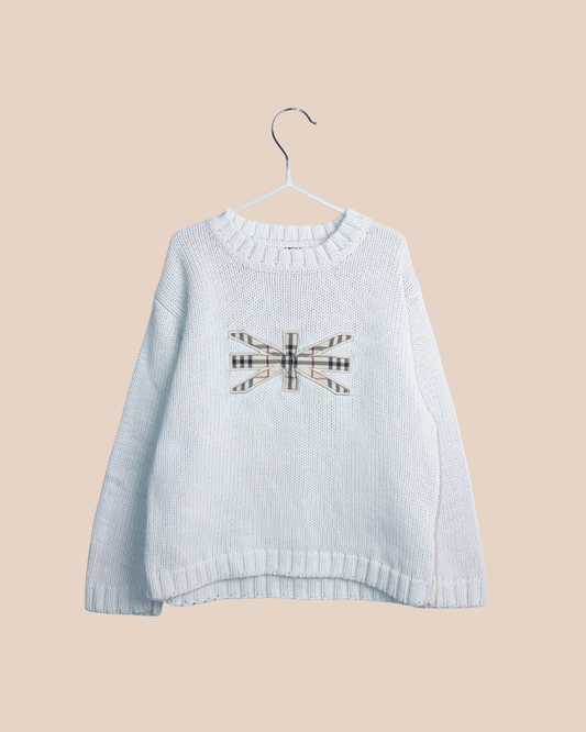 Pull Burberry écru enfant en seconde main en taille 4 ans