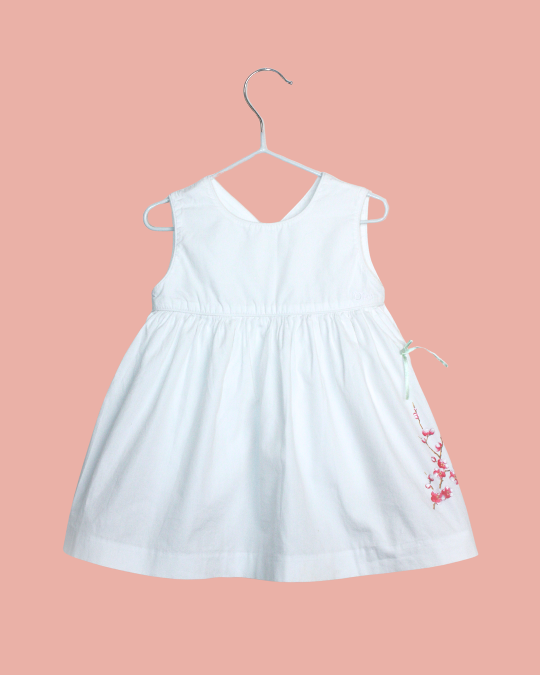 Robe barboteuse blanche à fleurs et noeud 6 mois