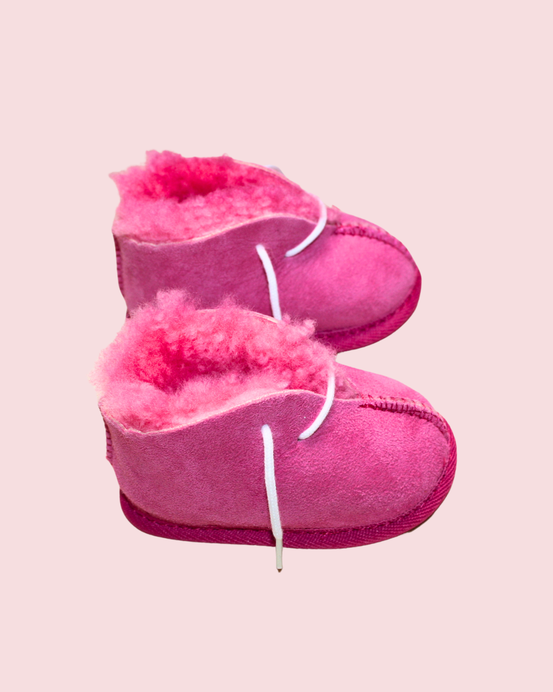 Chaussons roses en mouton taille 18